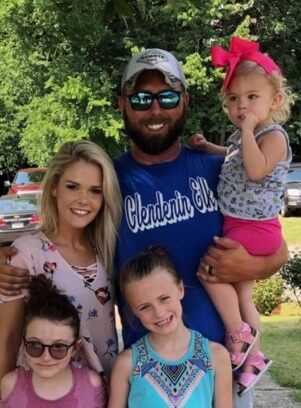 Corey Simms with his wife and three daughters